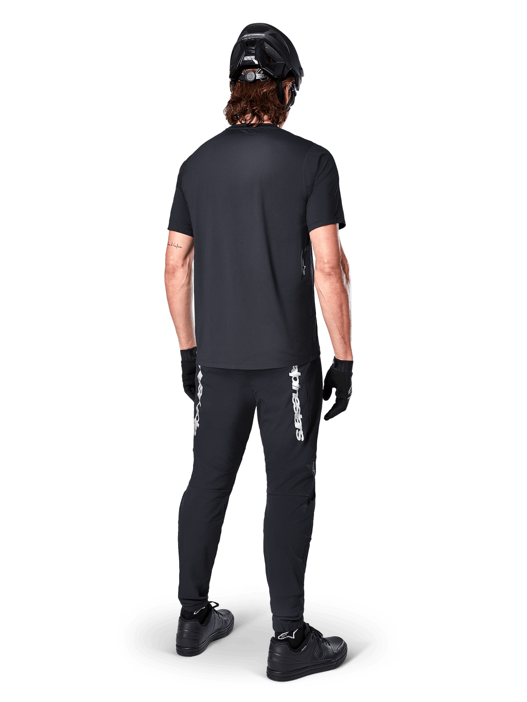 Alpinestars A-Dura Switch Jersey, Men's Black Short Sleeve MTB Shirt for Trail Riding, Back View on Model.