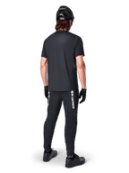 Alpinestars A-Dura Switch Jersey, Men's Black Short Sleeve MTB Shirt for Trail Riding, Back View on Model.
