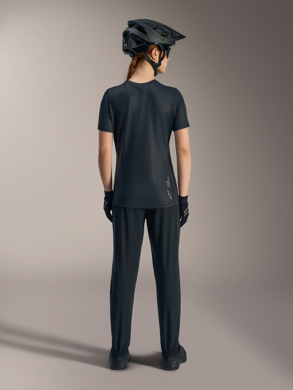 Black Stella A-Dura Ride Short Sleeve Jersey, back view, featuring Astars logo branding and casual MTB styling.