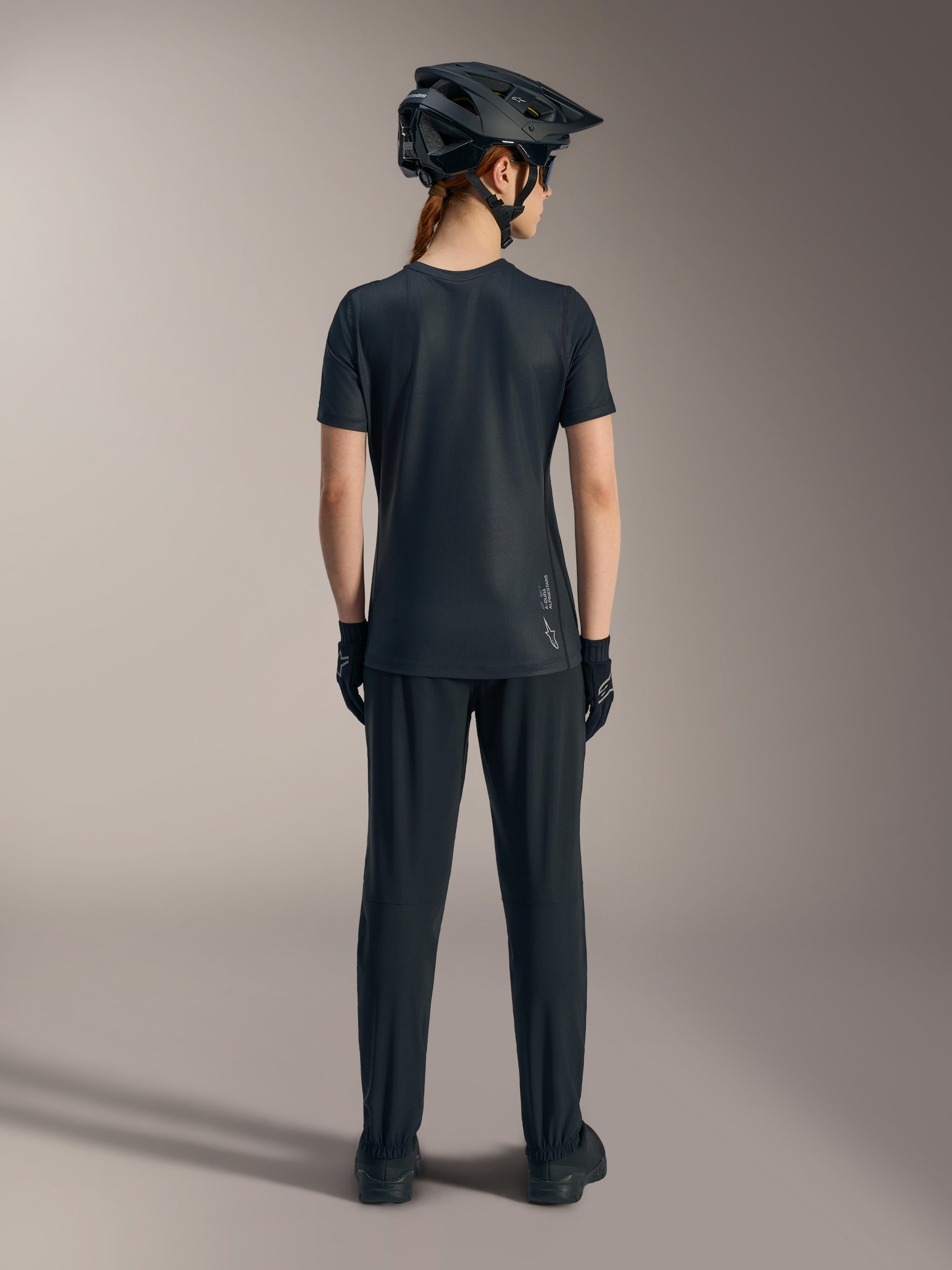 Black Stella A-Dura Ride Short Sleeve Jersey, back view, featuring Astars logo branding and casual MTB styling.