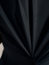 Black jacquard fabric detail of the Stella A-Dura Ride MTB Jersey, showing its flexible and breathable performance texture.