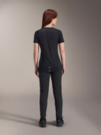Alpinestars Women Stella A-Dura Dri Switch Short Sleeve Jersey, Black, rear view on a model, featuring a longer drop tail and technical mesh panels, paired with black pants, performance MTB cycling gear