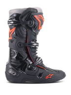 Alpinestars Tech 10 Boots, Motocross Off-Road Racing Boots, Black and Red Fluo, featuring a triple-buckle closure system, contoured TPU protective shell, red star logo on the toe, and high-performance construction for professional MX riding