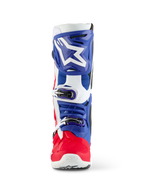 Alpinestars Limited Edition Fortitude Tech 10 Boot, Motocross Boot, Bright Red White and Blue, front view featuring a large white star logo on a blue shin plate, triple buckle closure system, and vibrant red foot shell, designed for elite off-road performance.