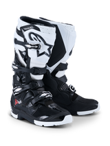 Alpinestars 2026 Tech 7 Enduro Boots, Motocross and Enduro Boots, Black and White, featuring a four-buckle closure system, prominent white Astar logo on the shin, TPU protective panels, and specialized enduro sole for off-road grip.