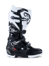Alpinestars 2026 Tech 7 Enduro Boots, Off-Road Motorcycle Boots, Black and White, featuring four metallic buckles, high-impact TPU protection panels, rugged dual-compound sole, and bold Alpinestars branding on the heel and shin