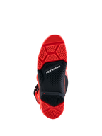 Alpinestars Tech 7 Enduro Boots featuring a red and black high-grip dual-compound sole for off-road motorcycle racing and enduro performance.