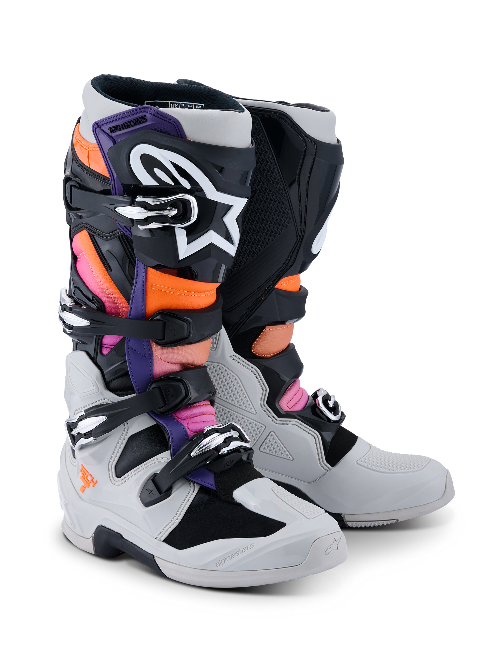 Alpinestars Tech 7 Boots, Motocross Boots, Black, Light Gray, Orange Fluo, and Magenta, featuring a multi-buckle closure system, reinforced TPU shell, and high-contrast branding, designed for professional off-road racing and protection.