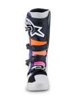 Alpinestars Tech 7 Boots, Motocross Boots, Black Light Gray Orange Fluo and Magenta, front view featuring a black shin plate with a large white Alpinestars star logo, multi-colored padded zones in orange and pink, and a durable white chassis with black buckles.