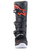 Alpinestars Tech 7 Enduro Boots, Black and Red Fluo, front view, featuring a large red logo on the shin plate, four-buckle closure system, and white outer sole accents, professional motocross and off-road footwear.