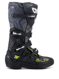 Alpinestars Tech 5 Boots, Motocross Off-Road Boots, side profile view, Black and Cool Gray with Yellow Fluo accents, featuring camouflage pattern, adjustable buckles, and rugged protective sole.