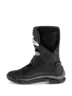 Alpinestars Belize Drystar® Boots, Black motorcycle boots, side profile view showing leather construction with TPU protection panels, suede texture, and a rugged vulcanized rubber outsole for adventure touring