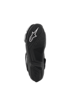 Alpinestars SMX-6 V3 Boots, Black, bottom sole view featuring a textured rubber outsole for grip, white Alpinestars logo on the heel, embossed branding, designed for track and street performance riding.