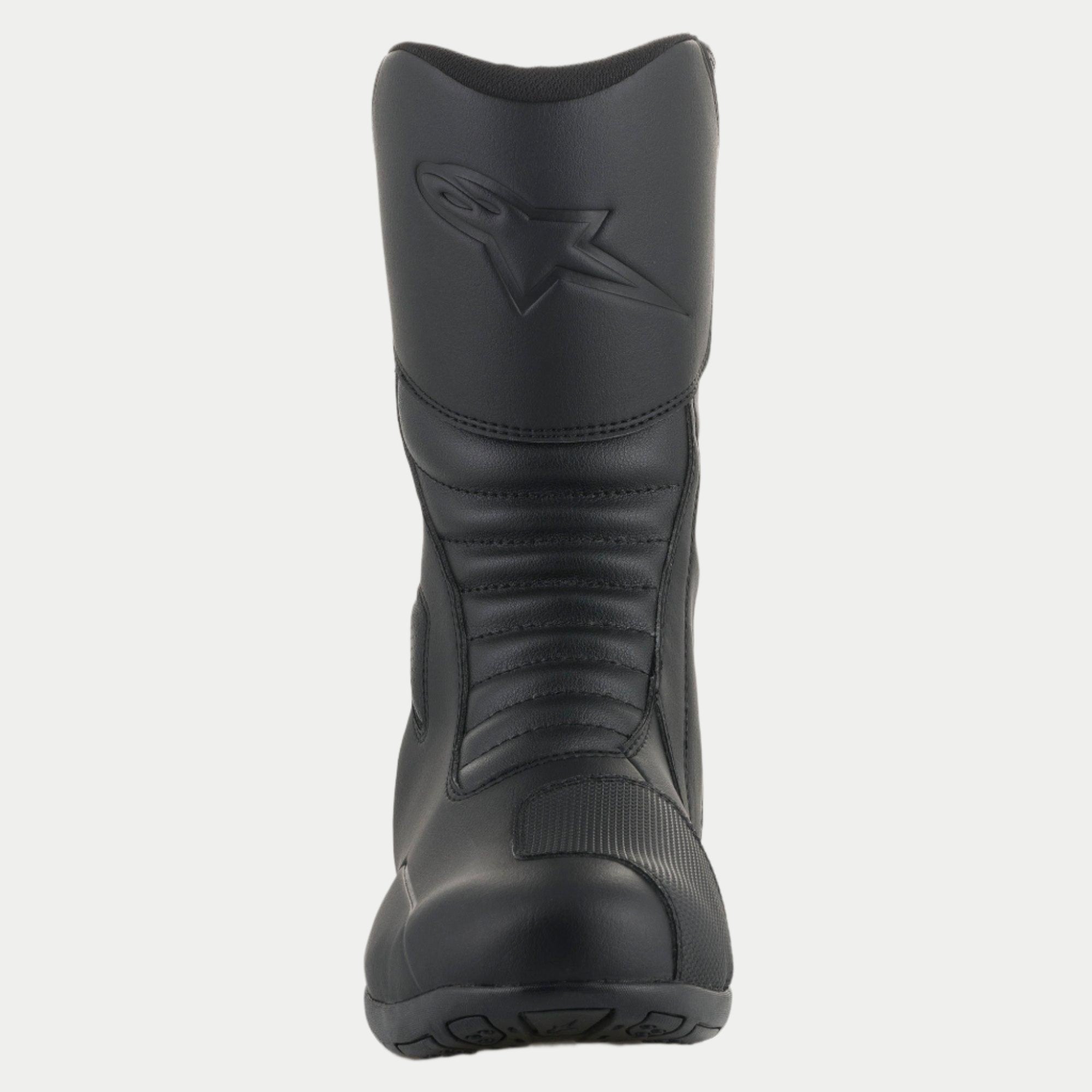 Alpinestars Origin Drystar® Boots, Black Motorcycle Touring Boots, front-facing view showing accordion flex zones, embossed logo on the shin, and durable microfiber construction with a synthetic shift pad.