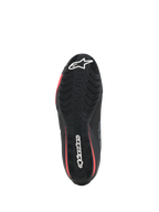 Alpinestars Celer Shoes, Motorcycle Riding Shoes, Black and Bright Red, bottom view showing the textured rubber sole with white Alpinestars branding and red accents.