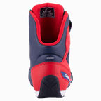Alpinestars Austin Riding Shoe, Night Navy and Bright Red, rear view showing reinforced TPU heel counter, red mesh lining, and textured rubber outsole, sporty motorcycle footwear
