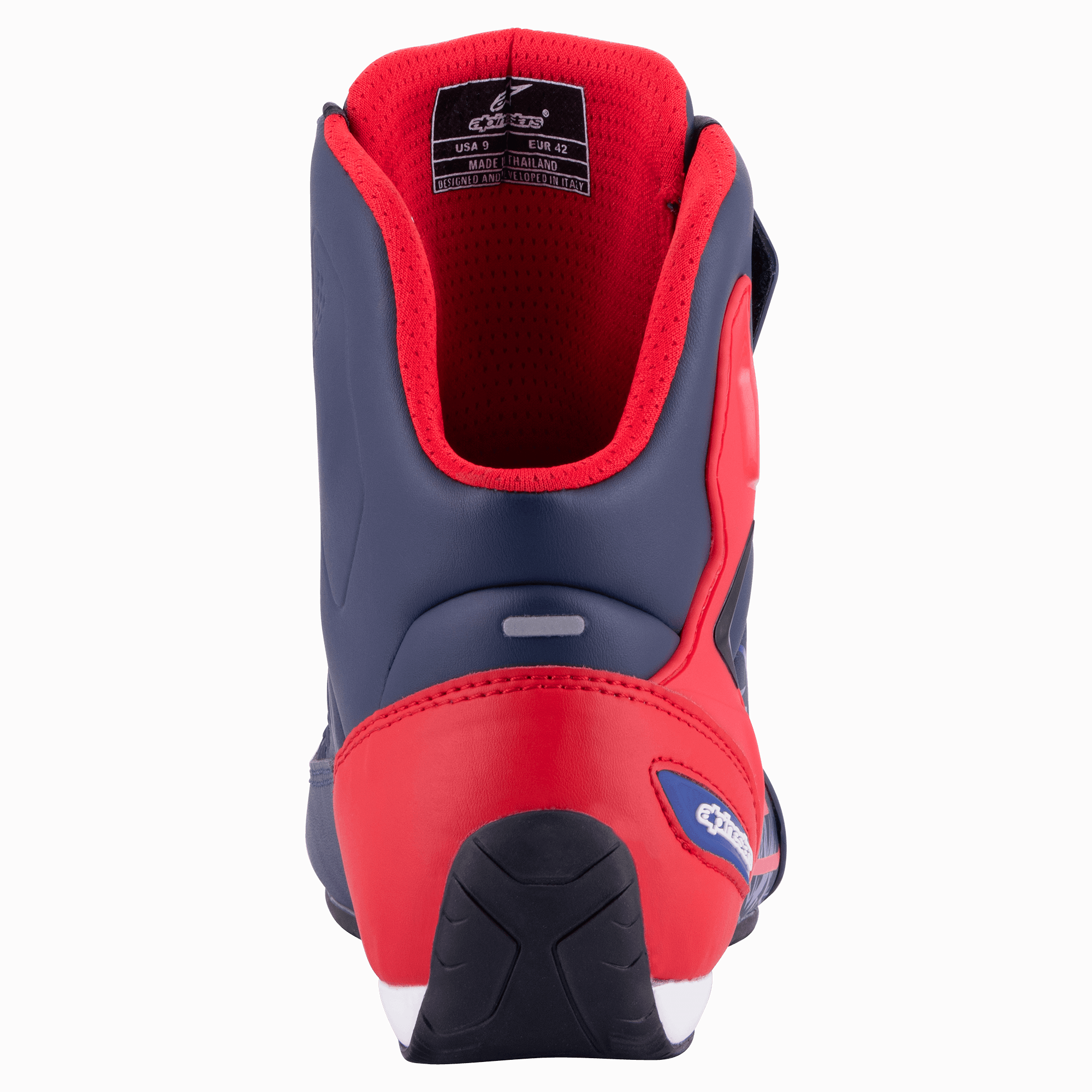 Alpinestars Austin Riding Shoe, Night Navy and Bright Red, rear view showing reinforced TPU heel counter, red mesh lining, and textured rubber outsole, sporty motorcycle footwear