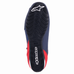 Alpinestars Austin Riding Shoe, Night Navy and Bright Red, bottom view showing black rubber outsole with textured wavy grip and white Alpinestars branding