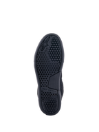 Alpinestars Chrome Air Shoe, Black, bottom view showing the outsole with a detailed hexagonal traction pattern, embossed Alpinestars logo and branding, durable rubber sole for urban motorcycle riding