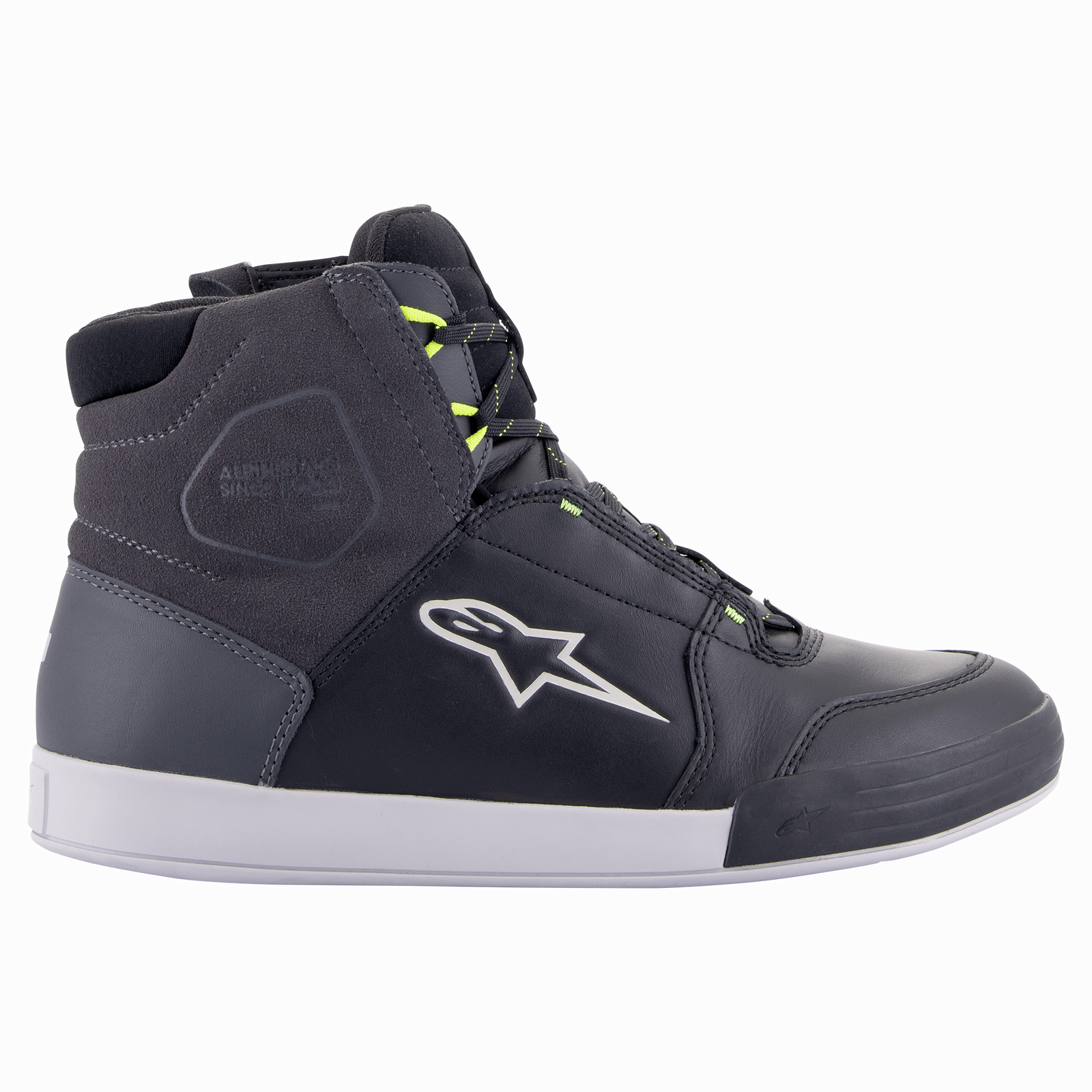 A pair of Chrome Drystar® Shoes by Alpinestars EU in black and dark gray with yellow fluo accents. These high-top shoes feature a logo resembling a stylized star on the sides and a decorative graphic detail near the heel. Perfect for the urban rider, they are laced up and set against a white background.