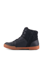 Alpinestars Chrome Drystar® Shoes, Black Black Gum, urban motorcycle footwear featuring a black leather and suede upper, high-top sneaker profile, gum-colored rubber sole, and side zipper entry.