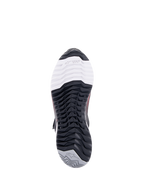 Alpinestars CR-X Women's Drystar® Riding Shoe, Motorcycle Riding Shoe, bottom view of the outsole, featuring TPF Transversal Protection Frame branding on a white toe section, black multi-directional tread pattern, and grey heel with star logo.