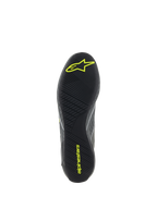 Alpinestars Supertech Shoes, Auto Racing Footwear, Cool Gray and Yellow Fluo, detailed view of the black rubber outsole with textured asymmetric tread and yellow Alpinestars logos for pedal grip and sensitivity.