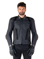 Alpinestars Missile V3 Airflow Leather Jacket, Black, Motorcycle Racing Jacket, worn by a model with black gloves and pants, featuring perforated leather panels, mesh ventilation, and external shoulder protectors, premium leather construction for sport riding.