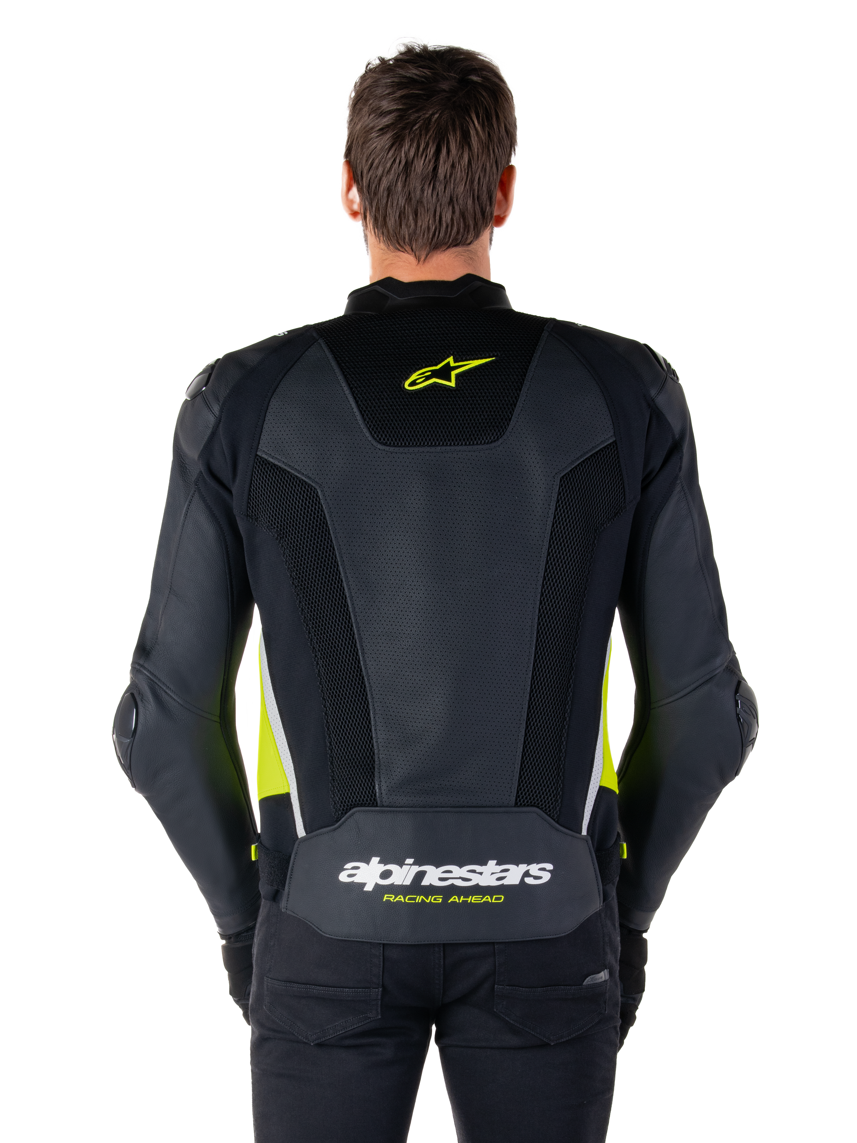 Alpinestars Missile V3 Airflow Leather Jacket, back view, black with fluo yellow and white accents, extensive perforated leather panels for cooling, Alpinestars branding on the upper and lower back, racing-inspired motorcycle sport jacket