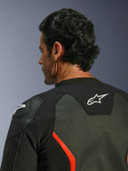 Alpinestars GP Force V2 Air Leather Jacket, Black and Red Fluo, close-up of the upper back and shoulder, featuring extensive leather perforations for airflow, white logo on the back, and GP Lite Evo shoulder protection