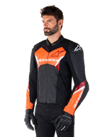 Alpinestars Faster V3 Leather Jacket, Black and Red Fluo, premium sport riding jacket with white and red accents, Alpinestars branding on chest and sleeves, worn with black motorcycle gloves and pants.
