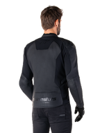 Alpinestars Faster V3 Leather Jacket, Black Black, Rear view of model wearing the sport riding jacket, featuring 'alpinestars' and 'RACING AHEAD' branding on the lower back, premium leather with matte panels, modern sport silhouette for motorcycle riding