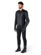 Alpinestars Faster V3 Leather Jacket, Black Black, worn with black pants, gloves, and boots, featuring a technical leather build with HRSF stretch panels, integrated DFS GP Lite shoulder protectors, and a sleek sport-derived silhouette