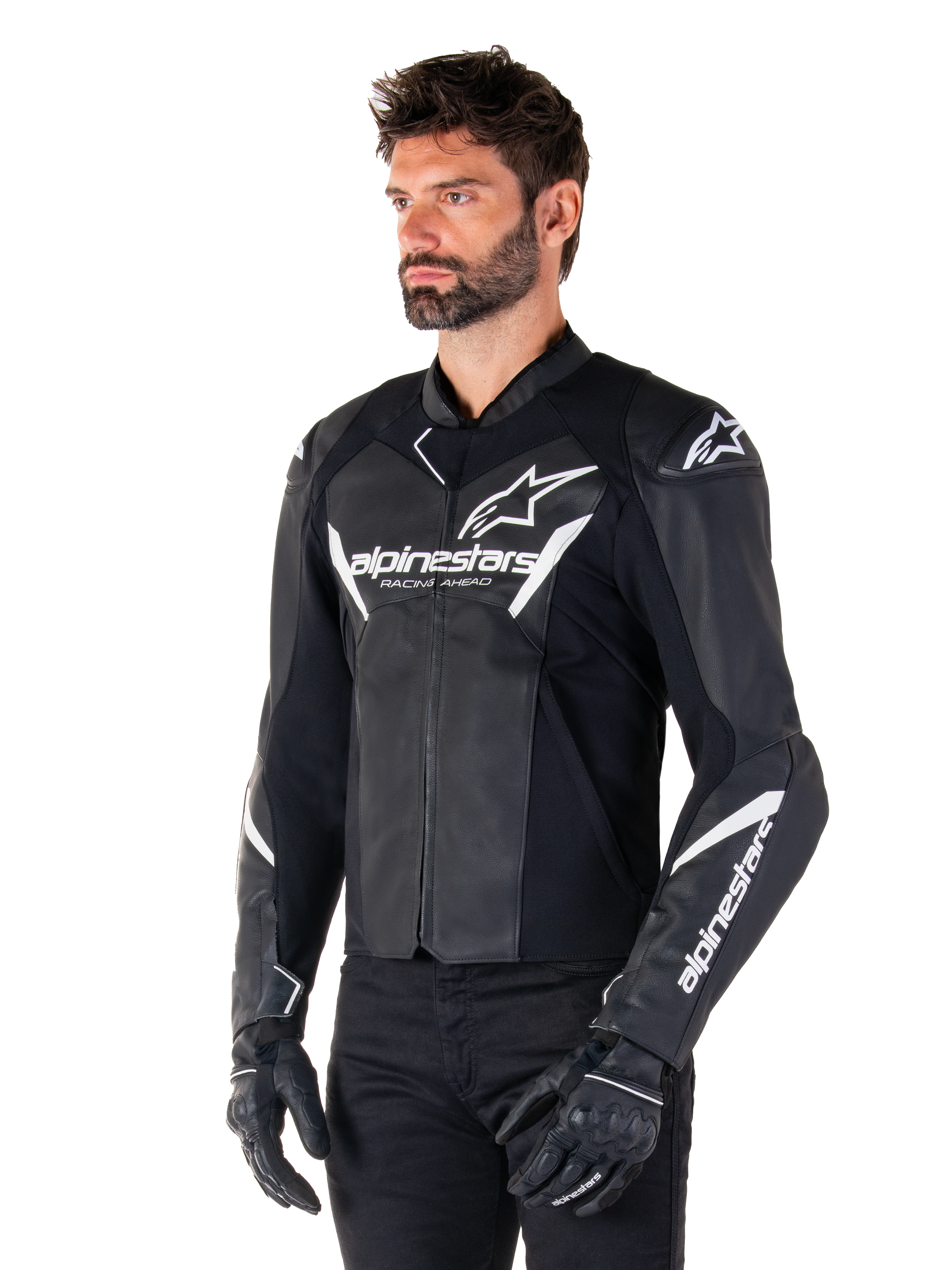 Alpinestars Faster V3 Leather Jacket, Sport Riding Motorcycle Jacket, Black and White, prominent white Alpinestars logo and 'Racing Ahead' text on the chest, star logos on the shoulders, premium leather construction with stretch panels, worn by a model with black pants and gloves