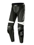 Alpinestars Stella Missile V3 Leather Pants, Women's Motorcycle Racing Pants, Black and White, featuring accordion stretch panels above the knees, integrated knee sliders with Alpinestars logo, white accent bands, and a streamlined fit for sport and track riding.