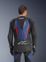 Alpinestars GP Force V2 Leather Suit 2-Piece, Back view, Black with Blue and Red Fluo accents, featuring perforated leather construction, Tech-Air Ready branding on the waist, and ergonomic stretch panels for racing performance.