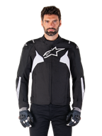 Alpinestars T-Jaws V4 Waterproof Jacket, Black and White, men's sport textile motorcycle jacket, featuring a white star logo on the chest, white shoulder accents, and white forearm stripes, high collar, athletic fit for road riding