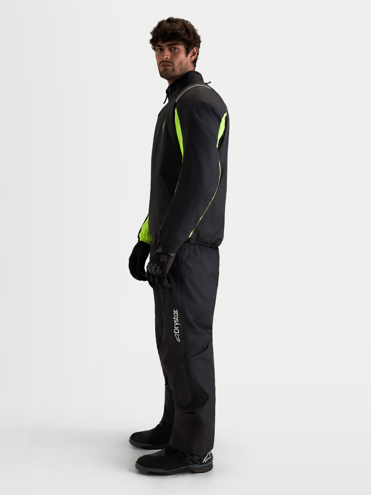 Alpinestars Harok V2 Drystar Jacket, Men's all-terrain adventure motorcycle jacket in Black and Aluminum Walnut with waterproof Drystar protection and high-visibility accents, worn by a model