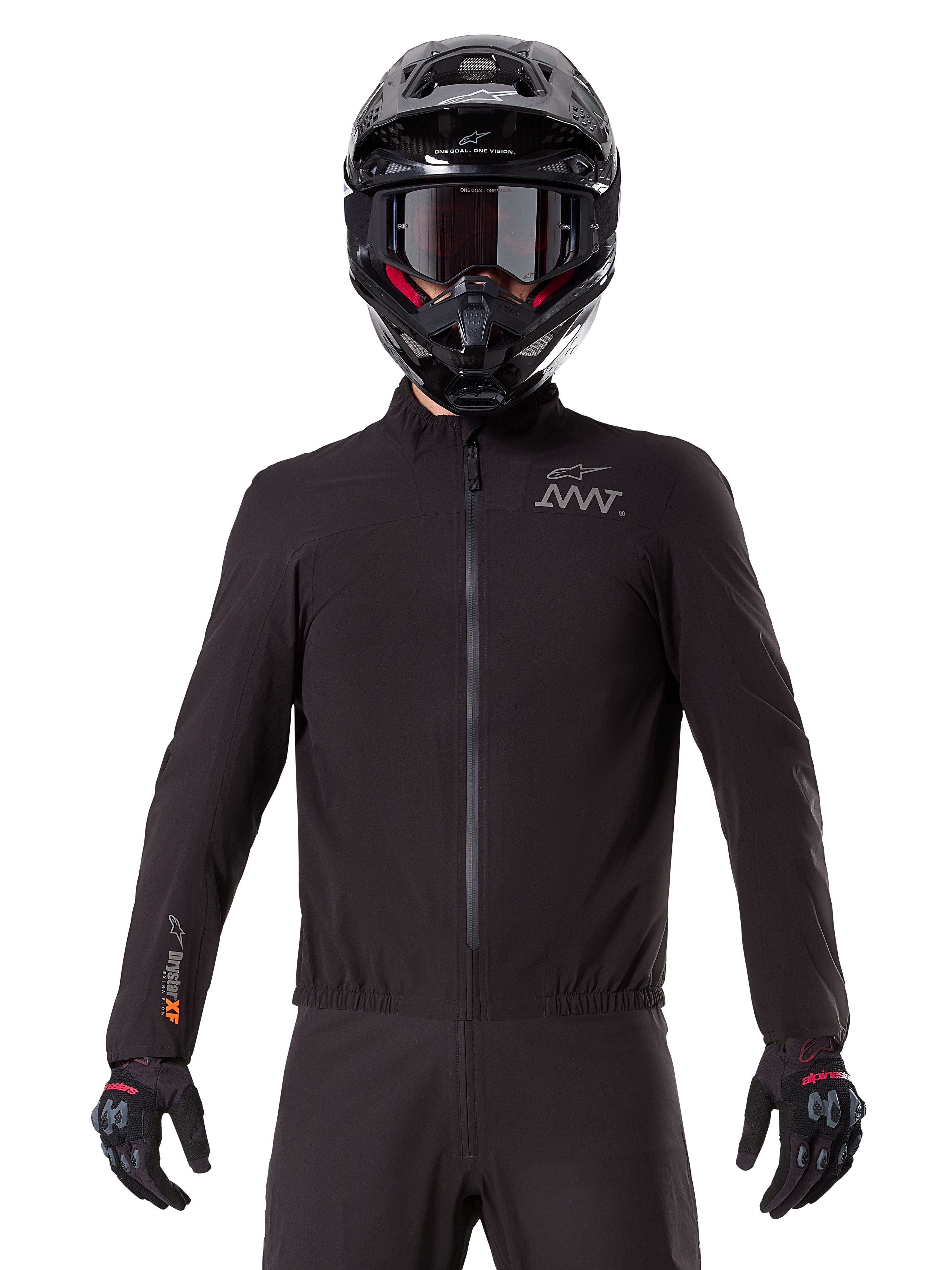 Alpinestars AMT-8 Stretch Drystar® XF Liner, black waterproof motorcycle liner, featuring a front zipper and elasticated waist, AMT logo on the chest and Drystar XF branding on the sleeve, worn with a black helmet and gloves.