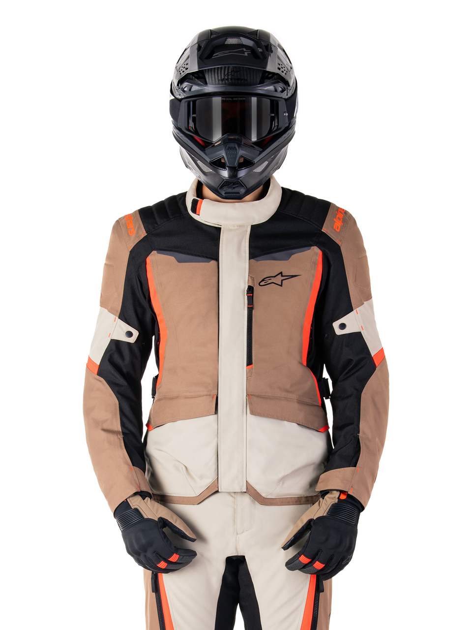 Alpinestars ST-1 Waterproof Jacket, Dark Khaki Sand Black Red Fluo, worn by a rider with a black helmet and gloves, adventure touring gear with beige and brown panels and bright red fluo accents, front view on a white background.