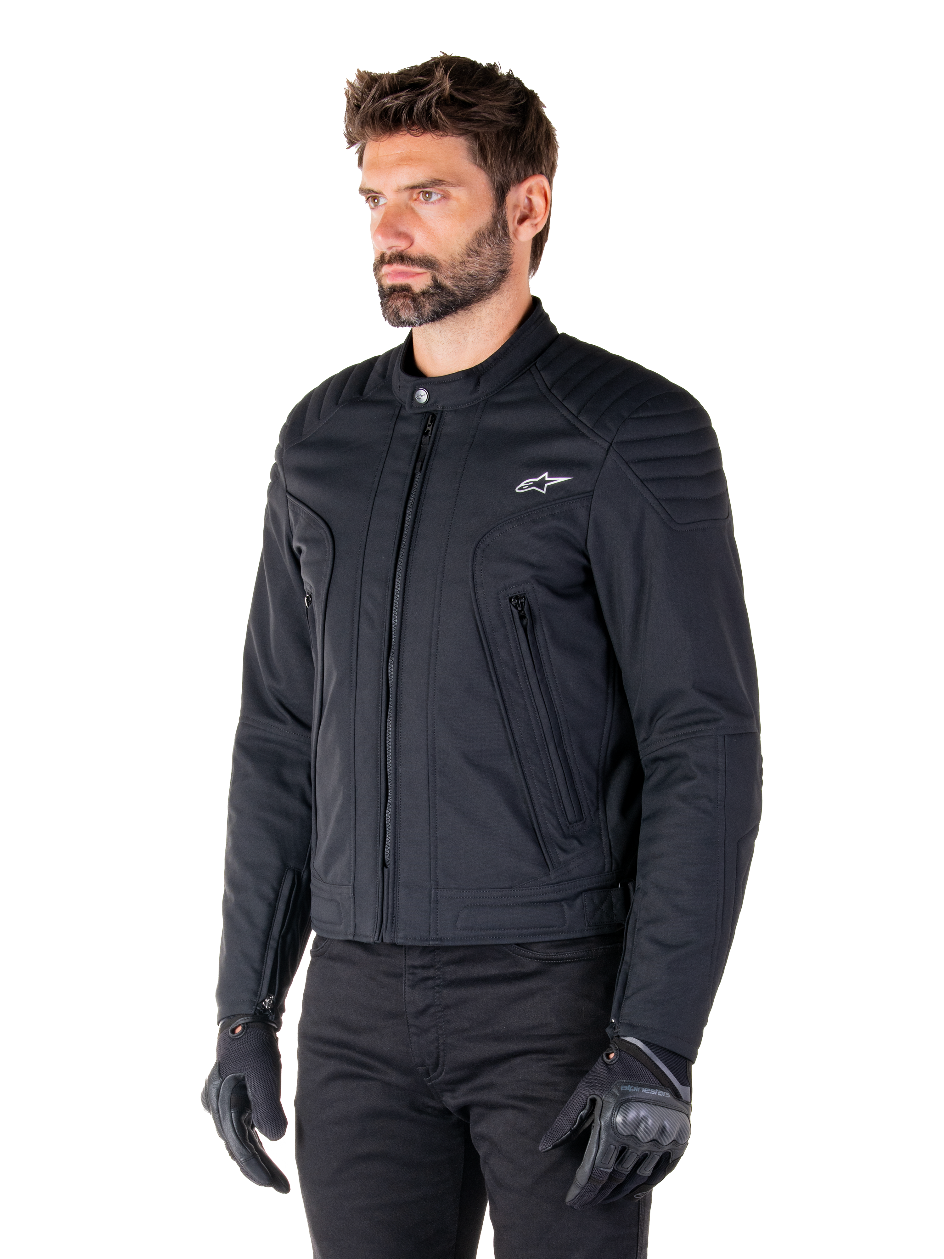 Alpinestars Clayton WR Jacket, Black, urban textile motorcycle jacket with quilted shoulder and forearm details, slim-fit design, matte finish, worn by a rider with black gloves.