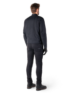 Rear view of a rider wearing the Alpinestars Clayton WR Jacket in Black, featuring quilted elbow and shoulder panels, ergonomic curved stitching, and reflective collar detailing, paired with black riding pants and boots for an urban motorcycle look.