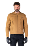 Alpinestars Clayton WR Jacket, Urban Motorcycle Jacket, Utility Brown Light Gold, water-resistant textile with quilted padded shoulders, high biker collar, black zipper details, and chest logo, worn with black protective gloves and pants