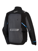 Alpinestars Cusco Drystar® Jacket, Adventure Touring Motorcycle Jacket, Black and Deep Gray, back view showing large gray rear panel, blue accents, Alpinestars logos on the upper and lower back, and durable ripstop textile construction