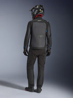 Alpinestars Cusco Drystar® Jacket, Black and Deep Gray, back view of rider wearing full adventure touring gear, large gray back panel with Alpinestars logo, blue sleeve accents, worn with matching black pants and helmet.
