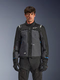 Alpinestars Cusco Drystar® Jacket, Motorcycle Touring Jacket, Black and Deep Gray, front view on model, featuring Alpinestars logos on chest and shoulders, Drystar® sleeve branding, technical multi-pocket design with ventilation zippers, paired with black riding gear