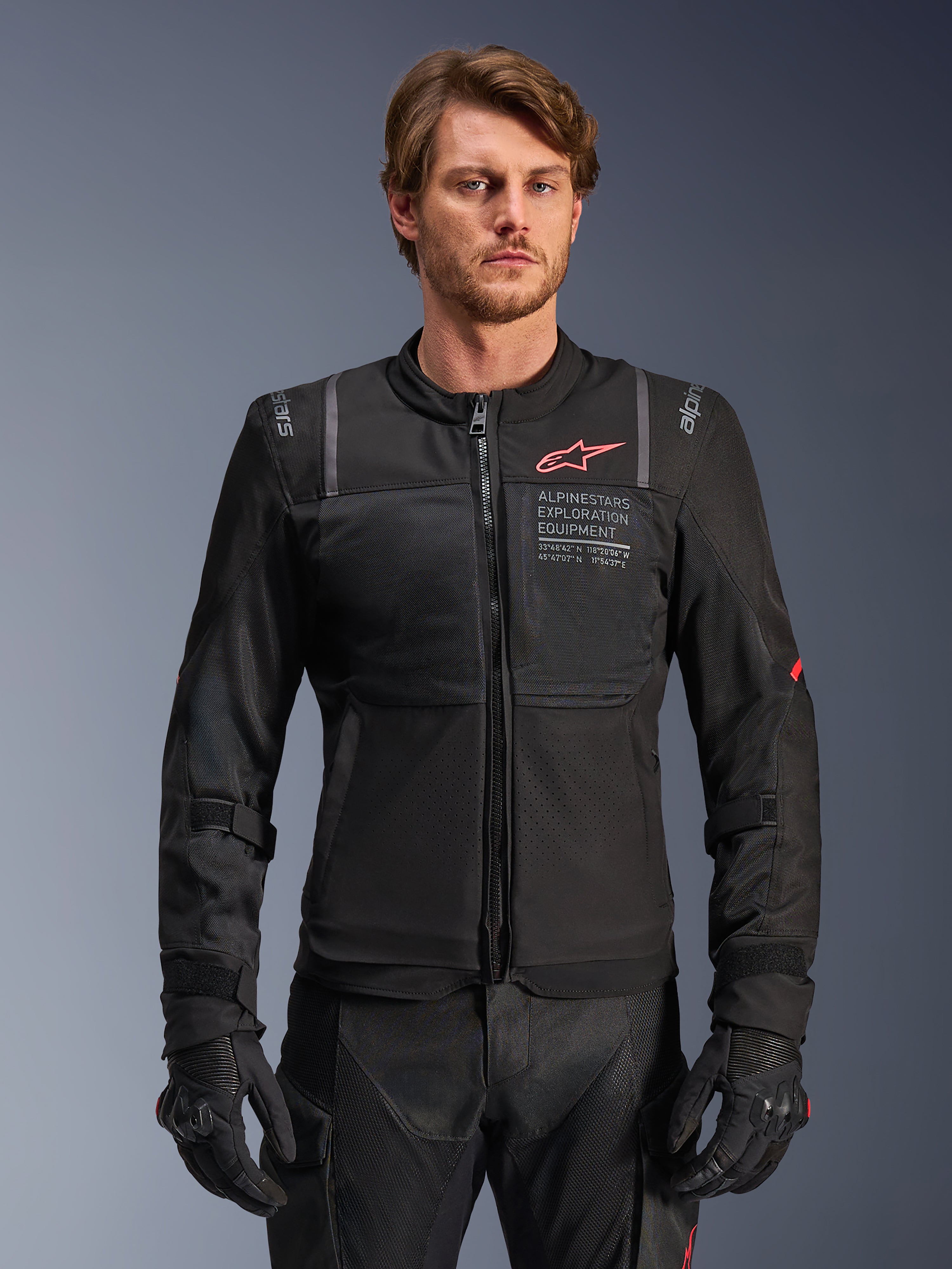 Alpinestars ST-2 Air Jacket, Black Men's Textile Riding Jacket with mesh panels and red logo branding, worn by model.
