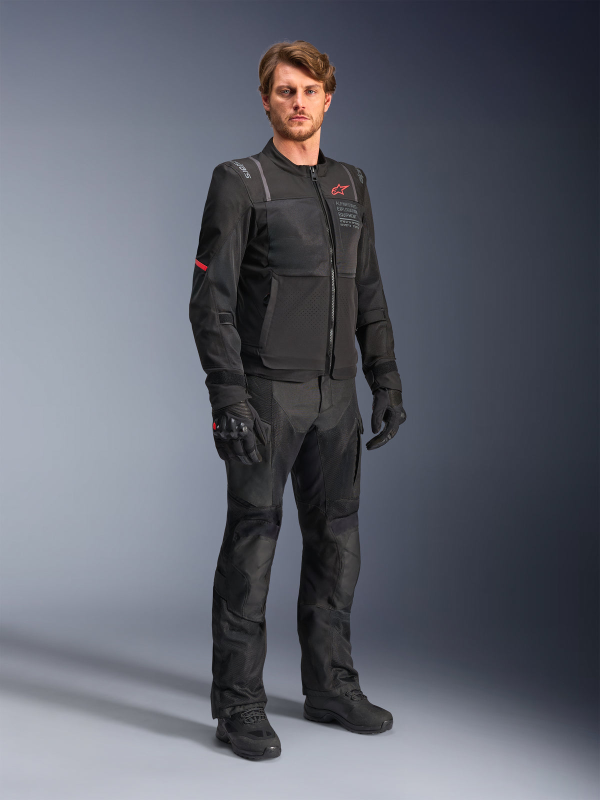 Alpinestars ST-2 Air Jacket in Black, a men's adventure touring motorcycle jacket with ventilated mesh and textile panels.