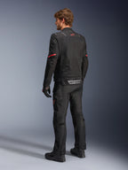 Alpinestars ST-2 Air Jacket, black adventure touring motorcycle jacket for men, mesh panels, red star logo, rear view.
