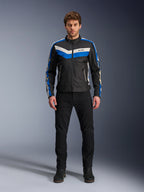 Alpinestars T-Dyno WR Jacket, Textile Motorcycle Jacket, Black Blue and Ecru, worn by male model with black pants and boots, featuring chevron stripes on the chest and heritage biker design